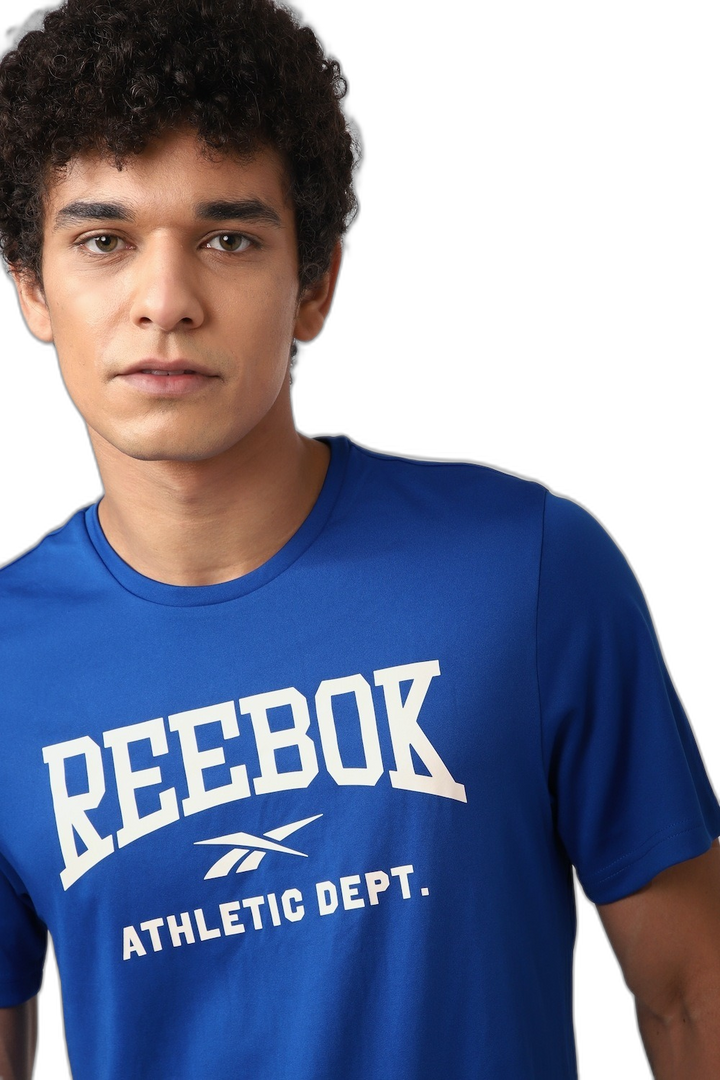 REMERA RBK Fitness WOR Poly Graphic SS