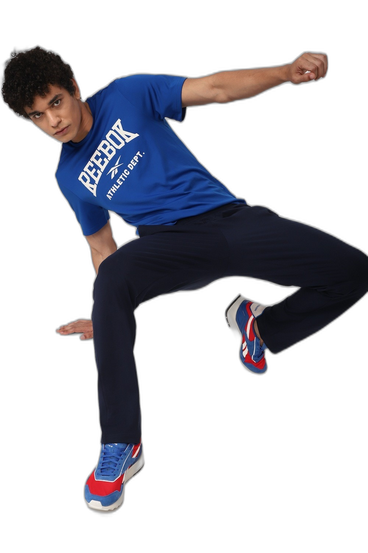 REMERA RBK Fitness WOR Poly Graphic SS